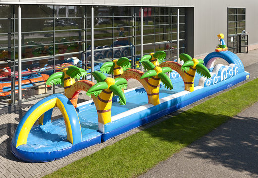 Spectacular inflatable beach belly slide 18 meters long with an extra wide track for children. Buy inflatable belly slides now online at JB Inflatables UK