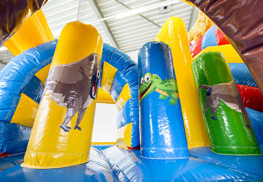Multiplay amazon safari bounce house with a slide, fun objects on the jumping surface and eye-catching 3D objects for kids. Order inflatable bounce houses online at JB Inflatables UK