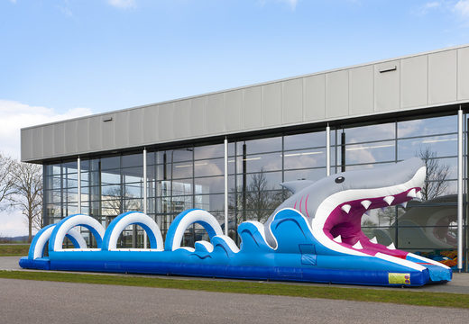 Order a perfect inflatable 18 meter long shark themed belly slide for children. Buy inflatable belly slides now online at JB Inflatables UK