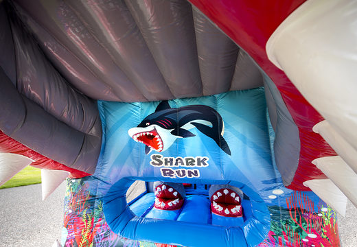 Buy inflatable 8 meter shark themed obstacle course with 3D objects for kids. Order inflatable obstacle courses now online at JB Inflatables UK