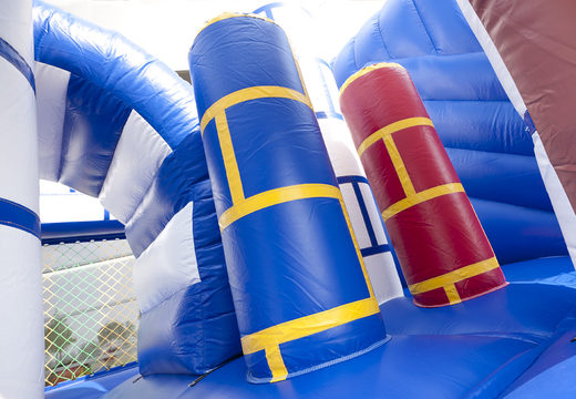 Medium inflatable multiplay bouncer in blue and white castle theme with slide for children. Order inflatable bouncers online at JB Inflatables UK