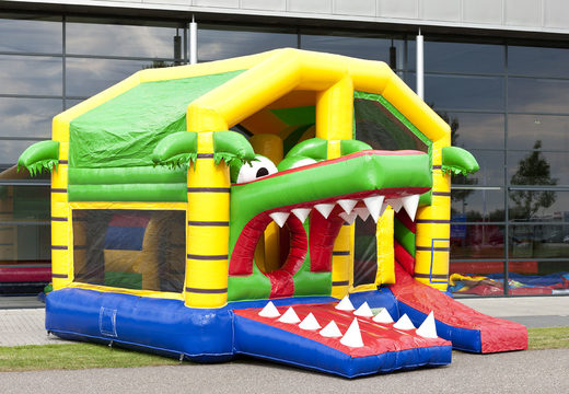 Multiplay bouncy castle with slide in crocodile theme for children. Buy inflatable bouncy castles online at JB Inflatables UK