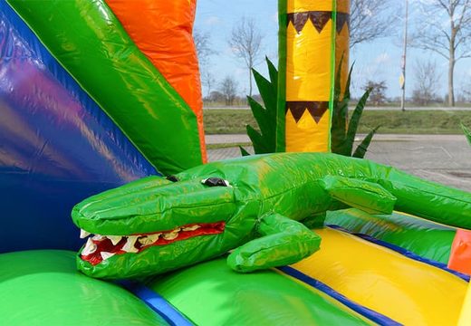 Order a covered multiplay jungle bouncer in a limited height of 2.74 meters and with a slide for both old and young. Buy bouncers online at JB Inflatables UK