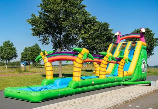 Buy Drop & Slide Jungle bouncy castle with double slide for kids. Order bouncy castles online at JB Inflatables UK