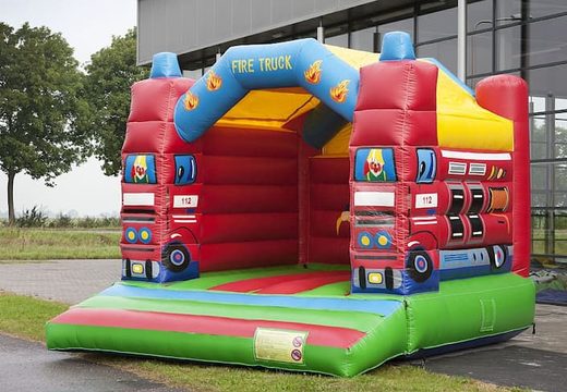 Order a standard fire brigade bouncy castle in striking colors for children. Order bouncy castles online at JB Inflatables UK